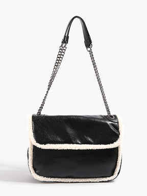 Bolsa de ombro de lã texturizada com aba